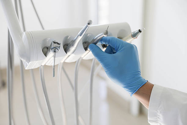 Professional Tooth Extraction technician working in Farmington, IL